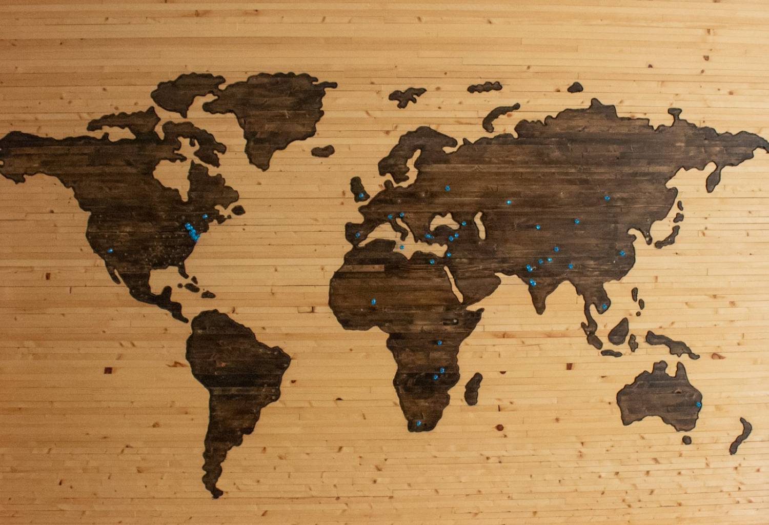 World map marked with service coverage points