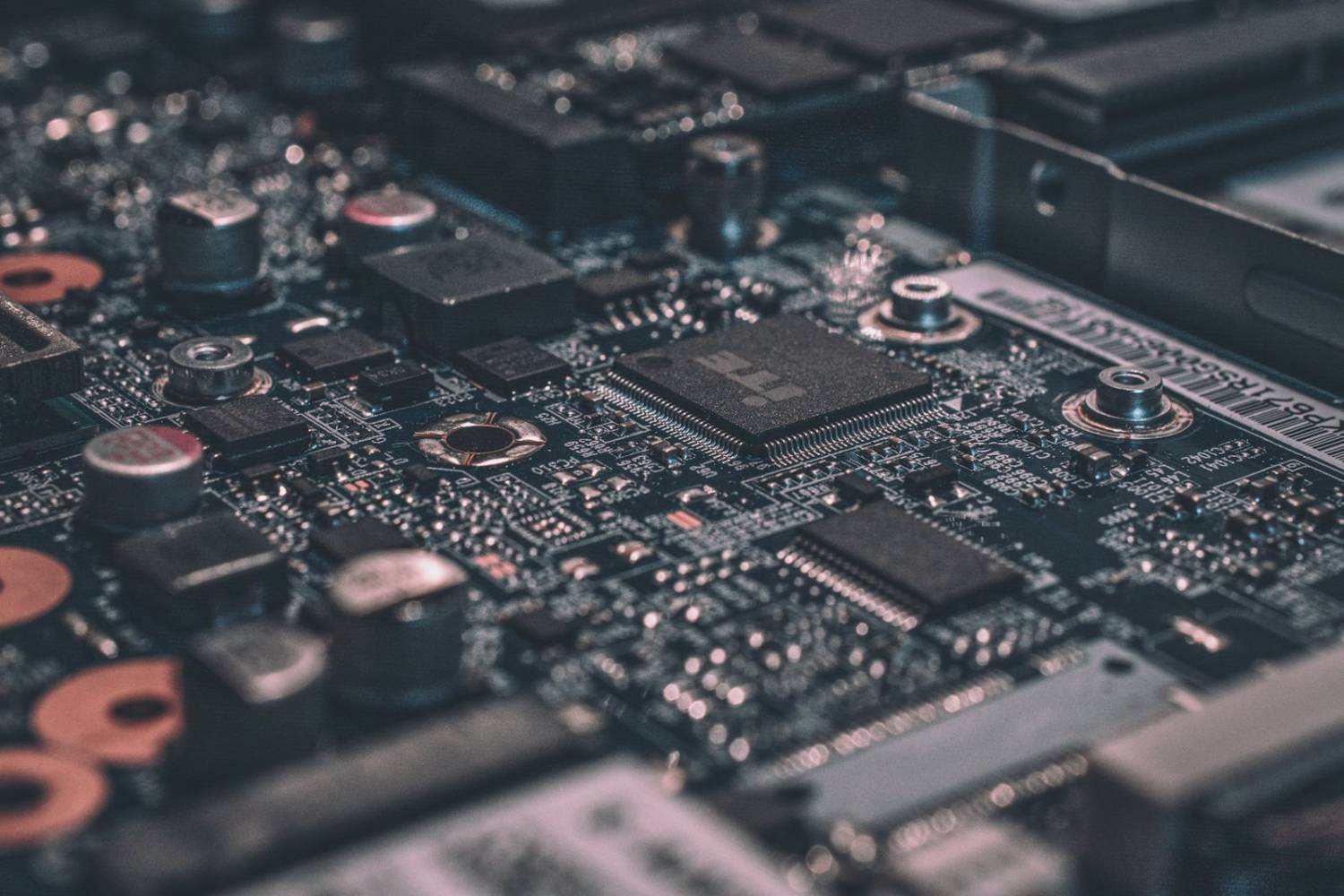 Close-up of a circuit board being recovered for reuse